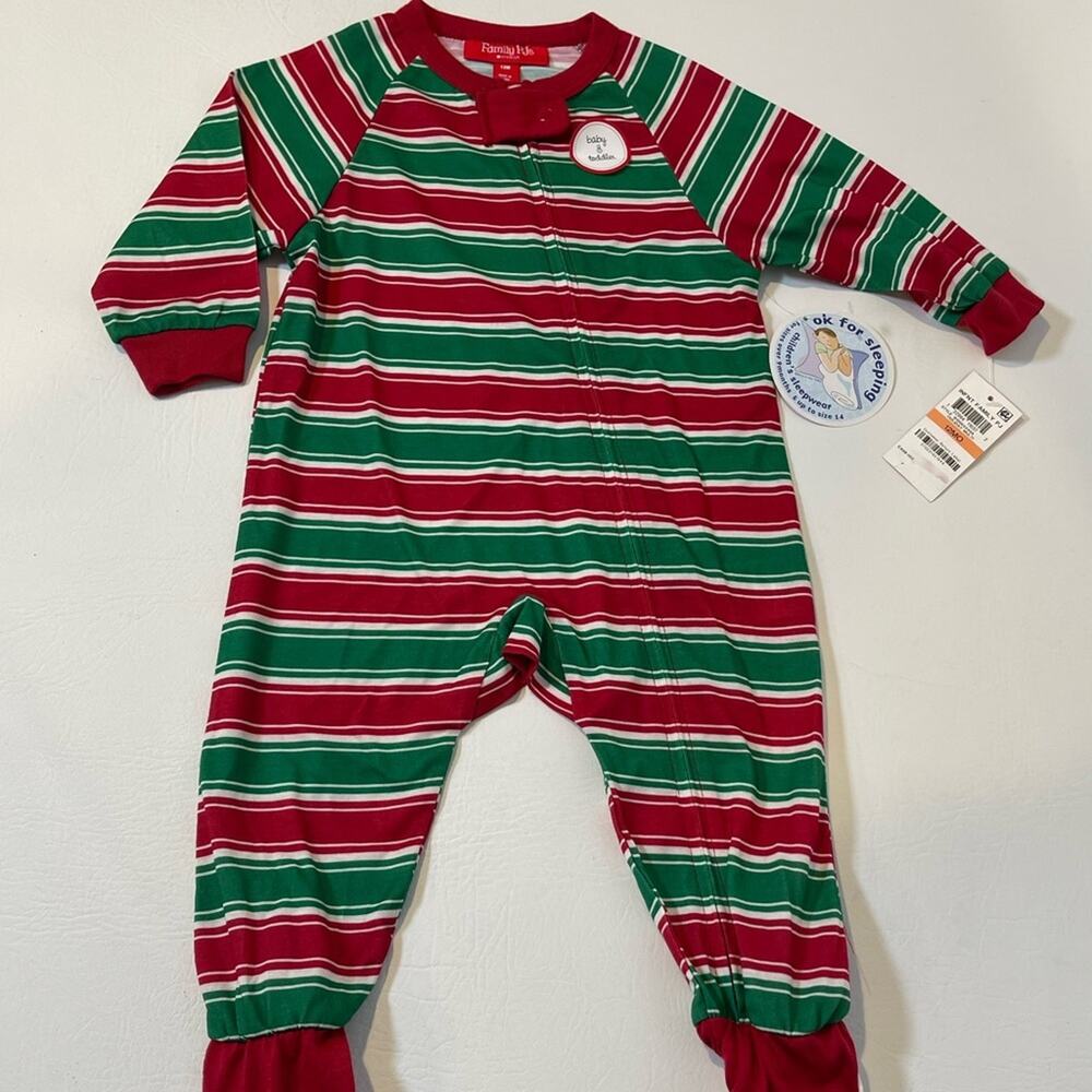 Family PJ’s by Macy’s. 12 months. One piece with zipper front and footies. NWT.